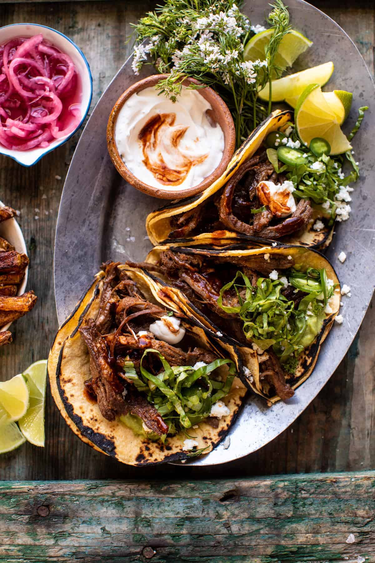 Quick Carne Asada Tacos with Charred Onions and Cilantro Lime Slaw