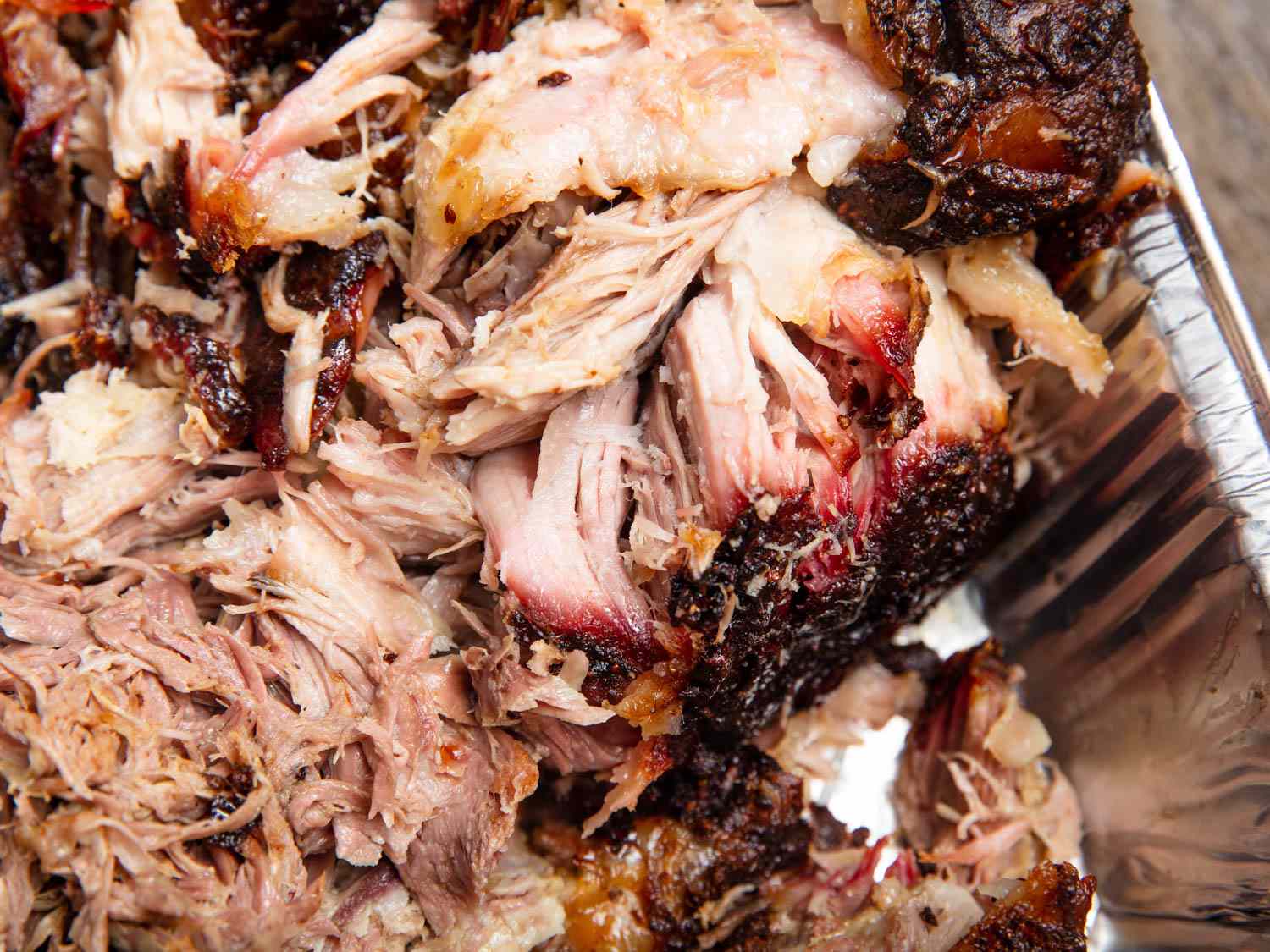 Slow-Smoked Pulled Pork Shoulder with Tangy Barbecue Sauce