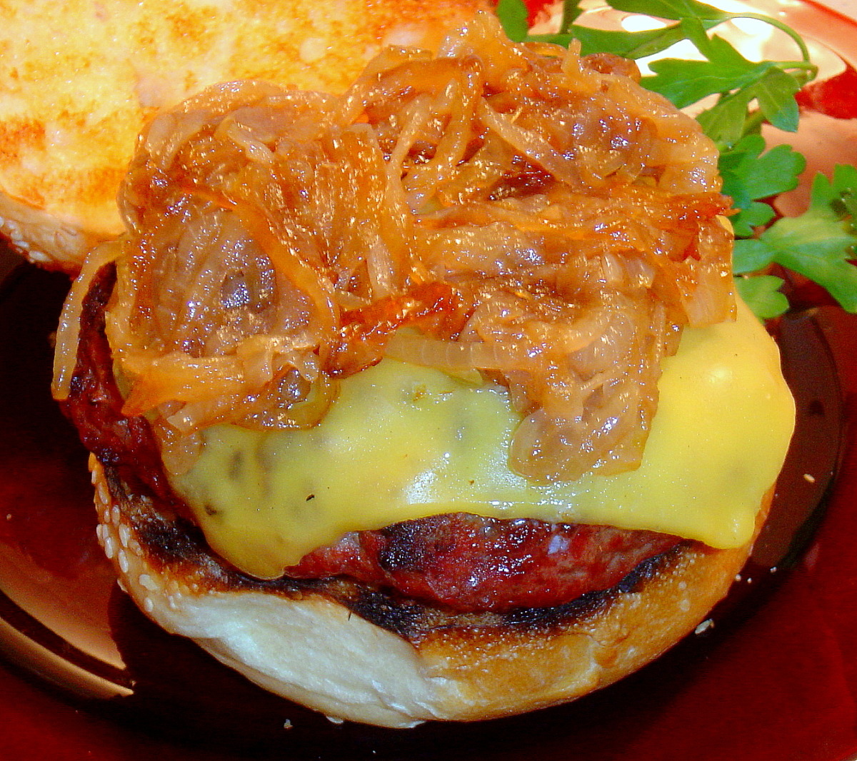 Grilled Applewood Burger with Beer-Braised Onions