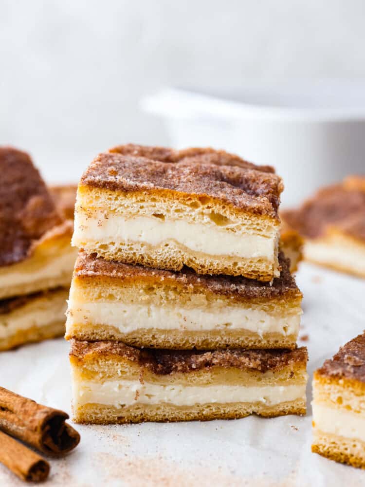 Layered Sopapilla Cheesecake with Cinnamon Sugar Crust