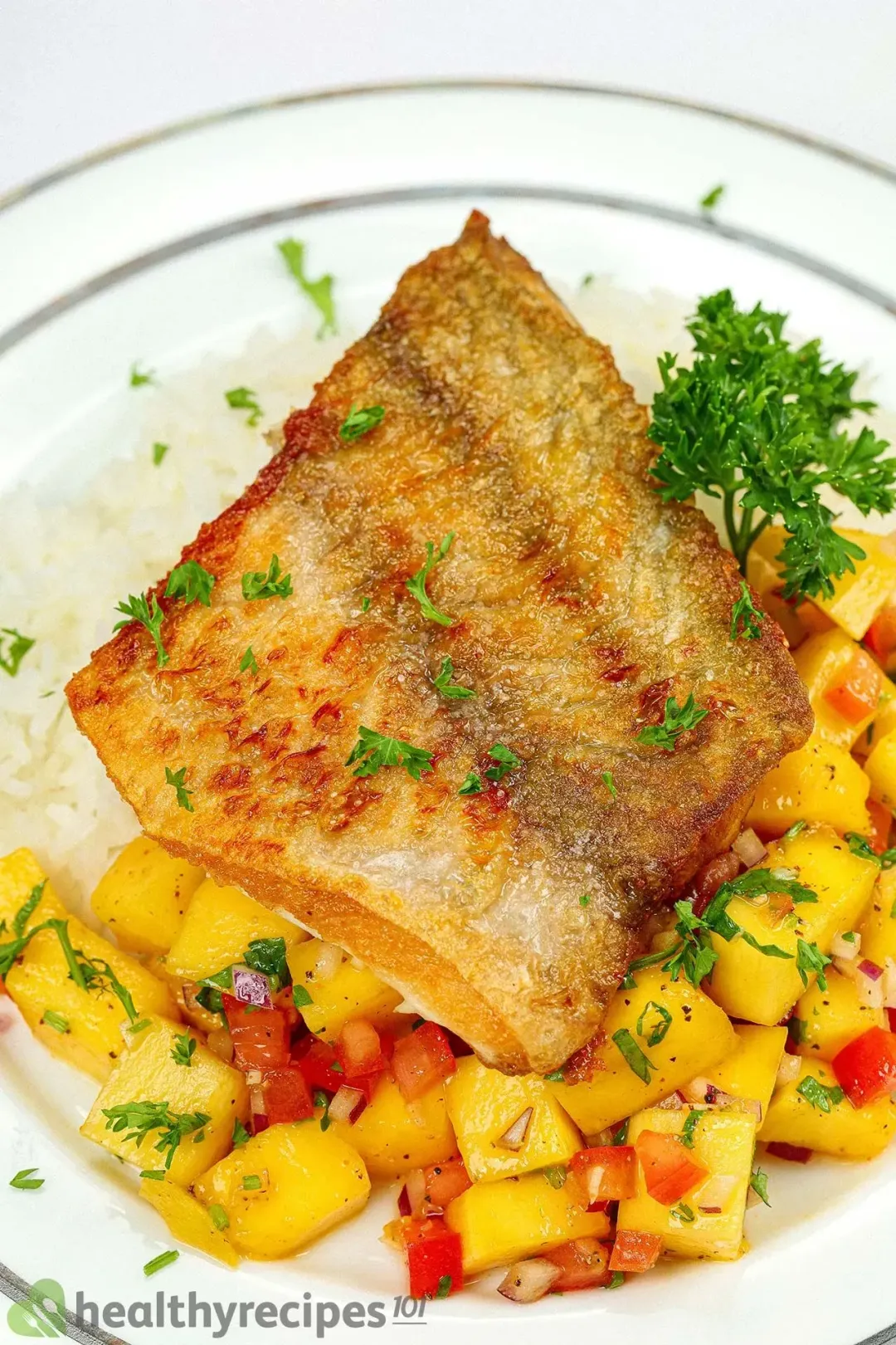 Pan-Seared Sea Bass with Cilantro-Lime Sauce and Mango Salsa