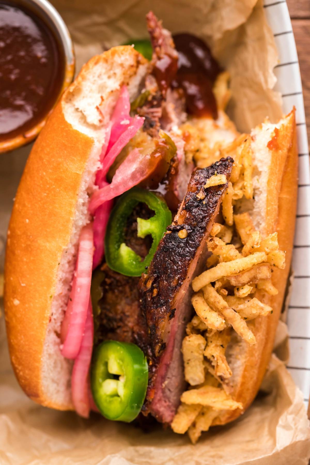 Grilled Texas-Style Smoked Brisket Sandwich with Pickled Onions