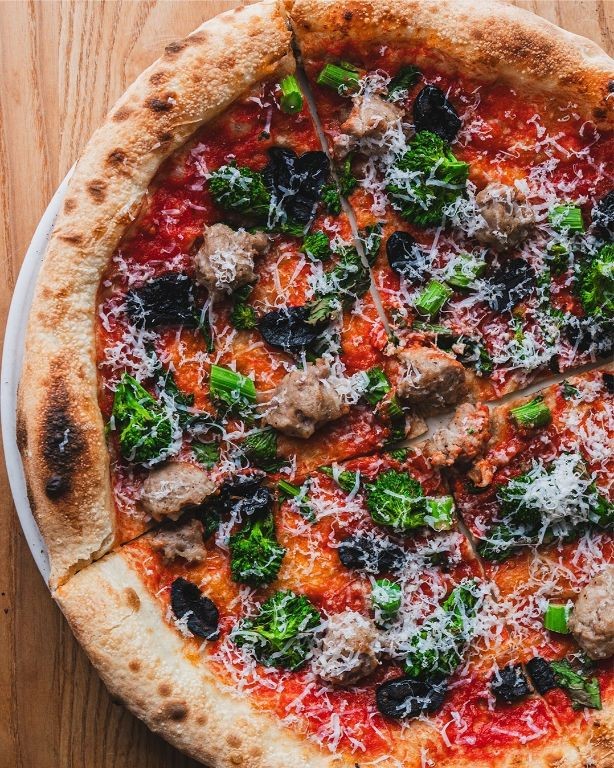 Wood-Fired Italian Sausage Pizza with Roasted Garlic and Arugula