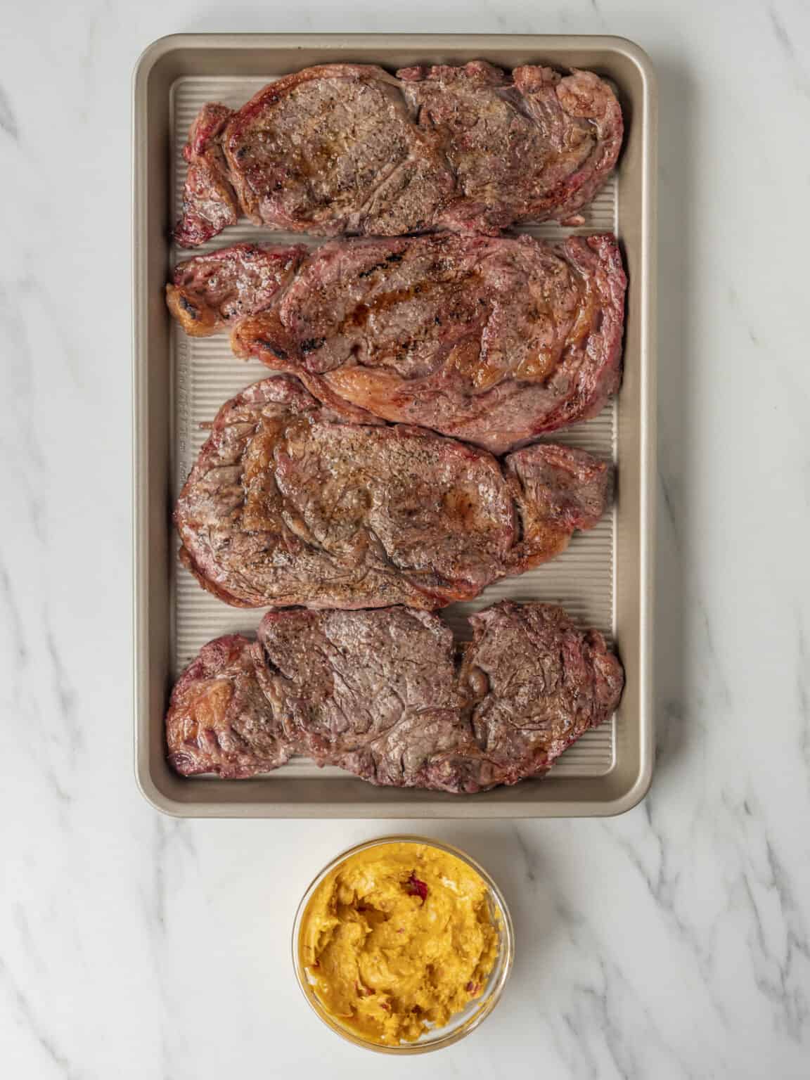 Grilled Texas-Style Ribeye with Smoked Chili Butter