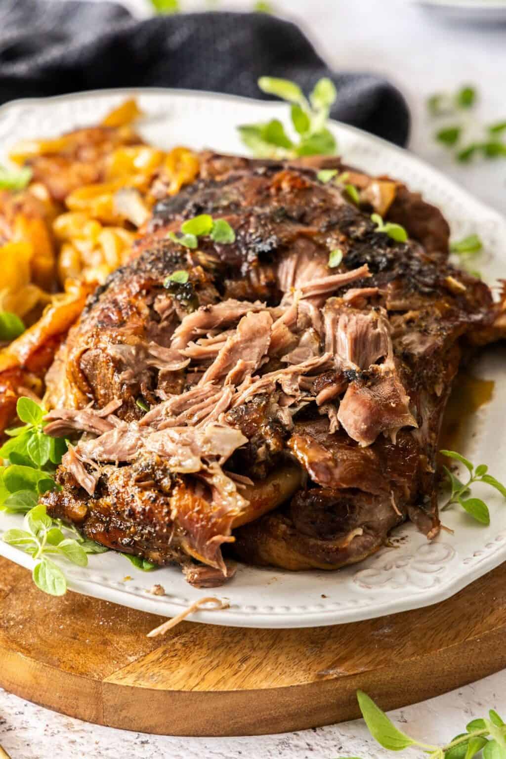 Slow-Roasted Lamb Shoulder with Mediterranean Herb Sauce