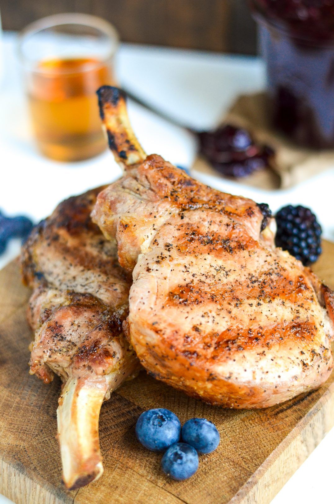 Grilled Bourbon-Blackberry Pork Chops with Rosemary Butter
