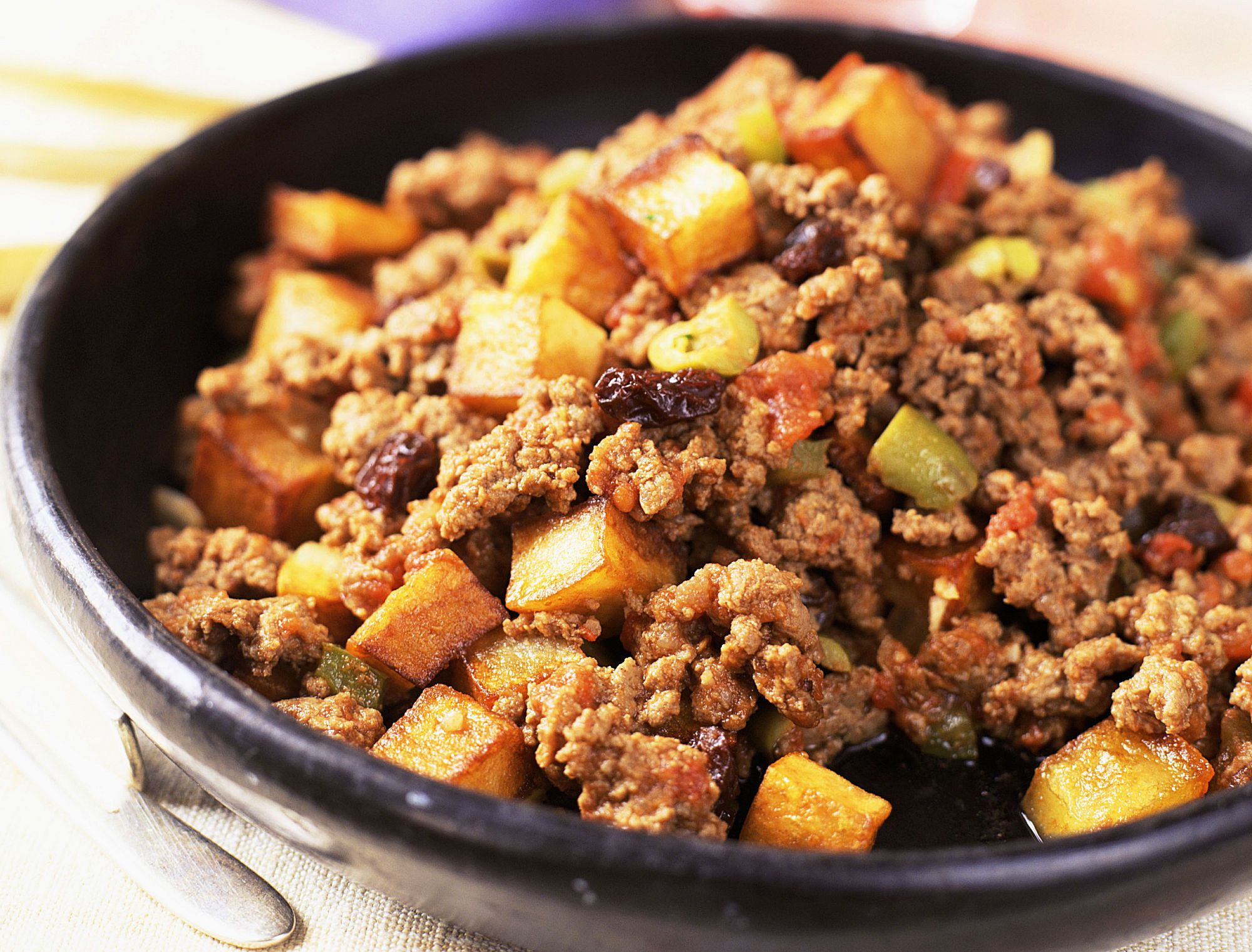 Braised Beef Picadillo with Roasted Poblano Peppers