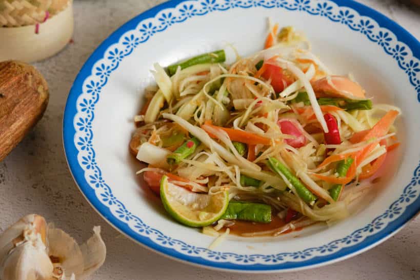 Lao-Style Papaya Salad with Fermented Crab and Toasted Rice