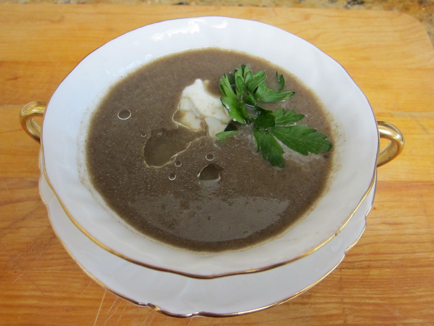 Aromatic Mushroom Consommé with Truffle Oil
