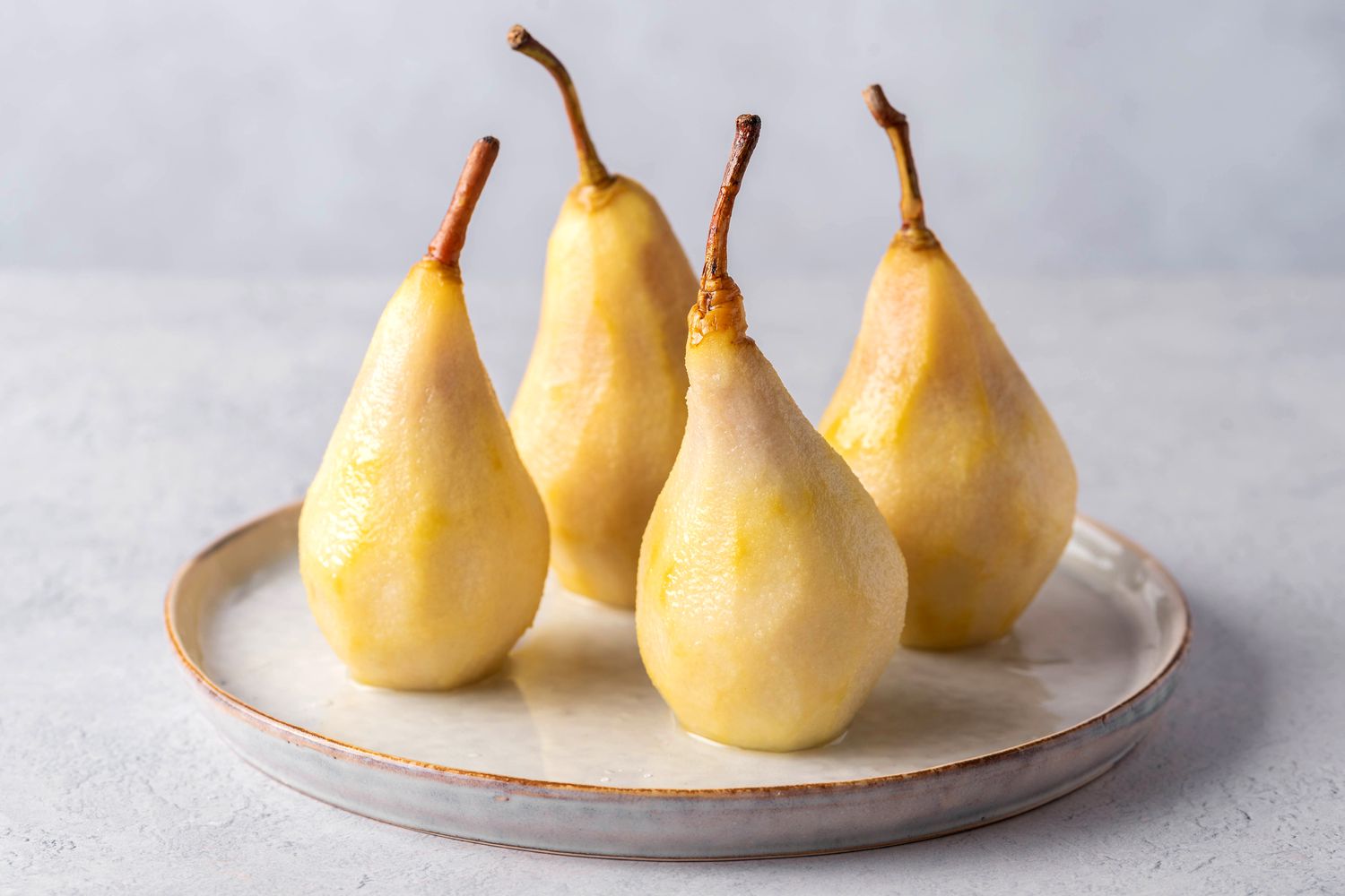 Spiced Wine-Poached Pears with Michigan Maple Cream