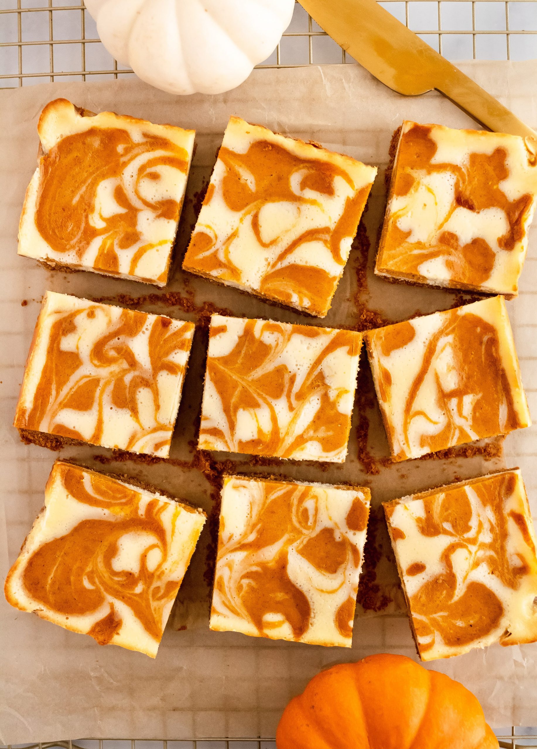 Baked Pumpkin Pie Bars with Spiced Cream Cheese Swirl