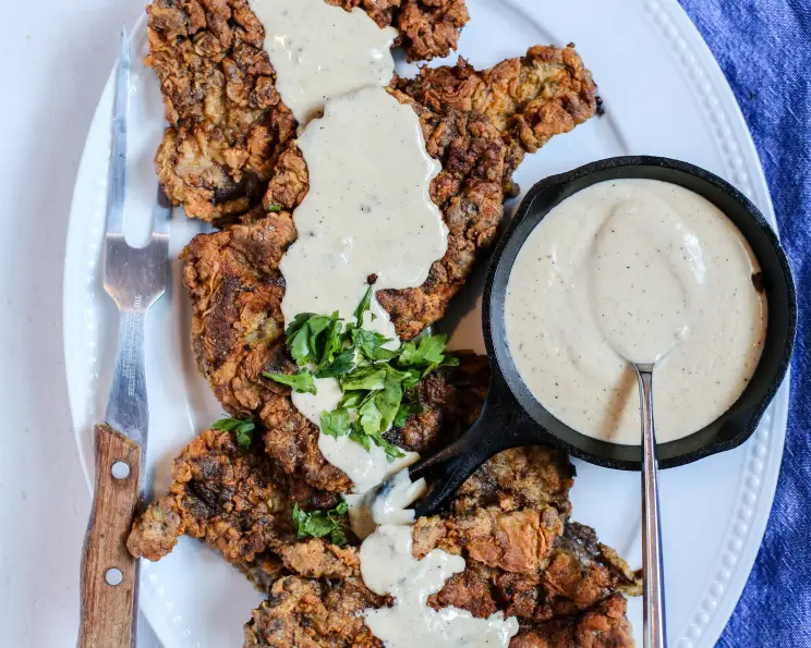 Oven-Baked Chicken-Fried Steak with Creamy Pepper Gravy
