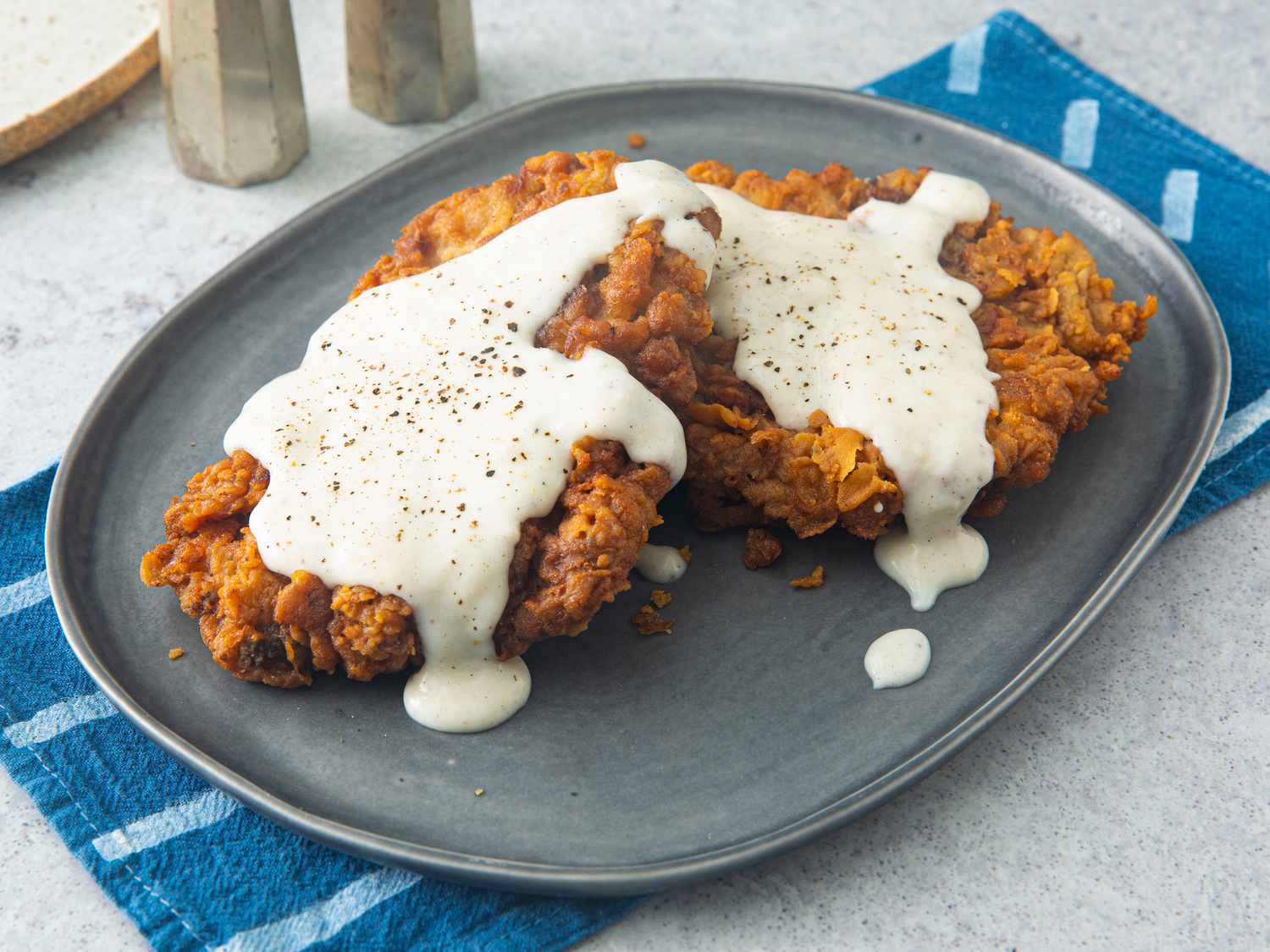 Pan-Roasted Chicken Fried Steak with Creamy Pepper Gravy