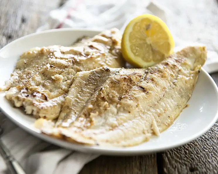 Grilled Cajun-Spiced Catfish with Lemon Butter Sauce