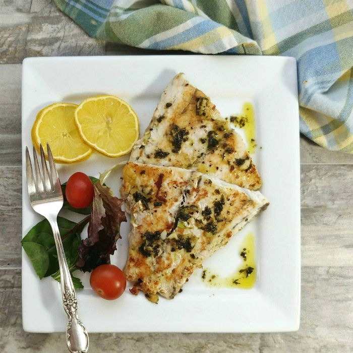 Tasmanian Pepperberry-Infused Barramundi with Lemon and Macadamia Salad