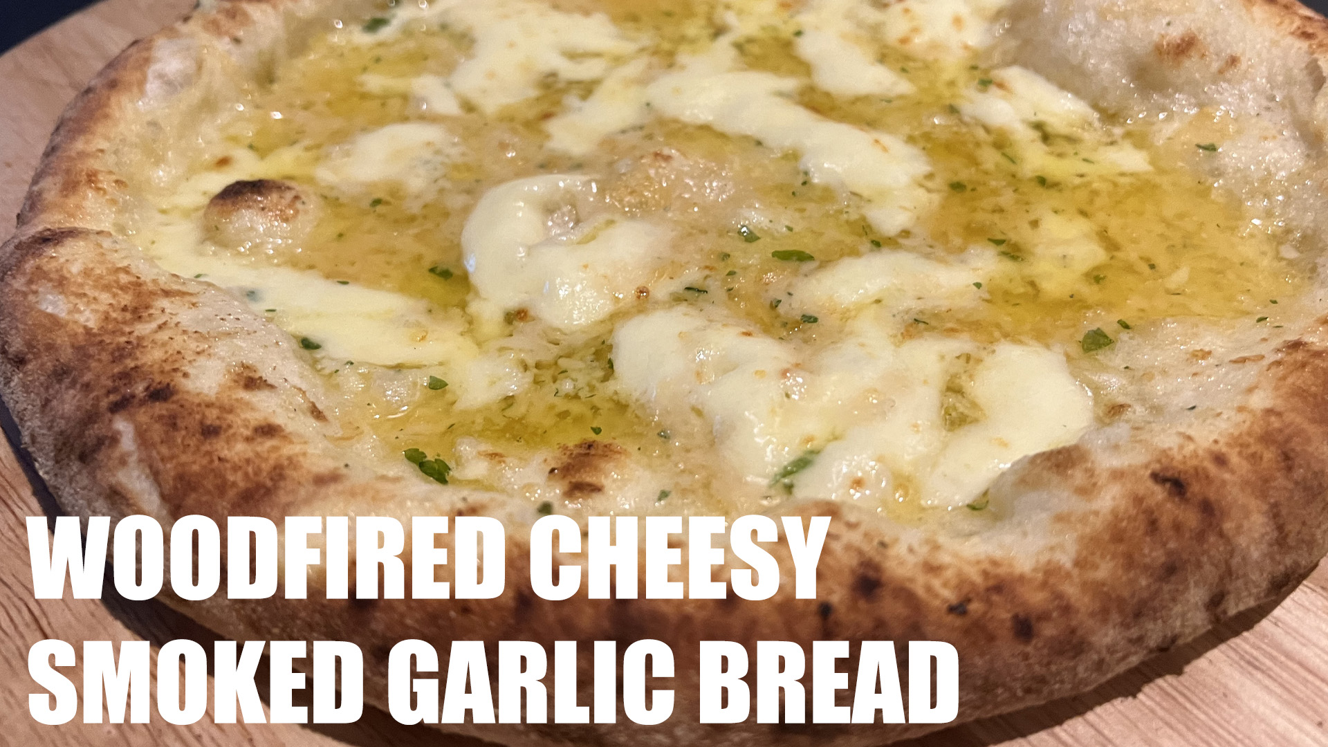 Wood-Fired Flatbread with Roasted Garlic and Smoked Gouda