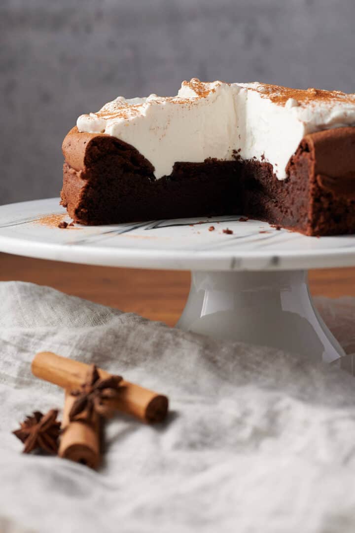 Cinnamon-Spiced Flourless Chocolate Cake with Whipped Cream