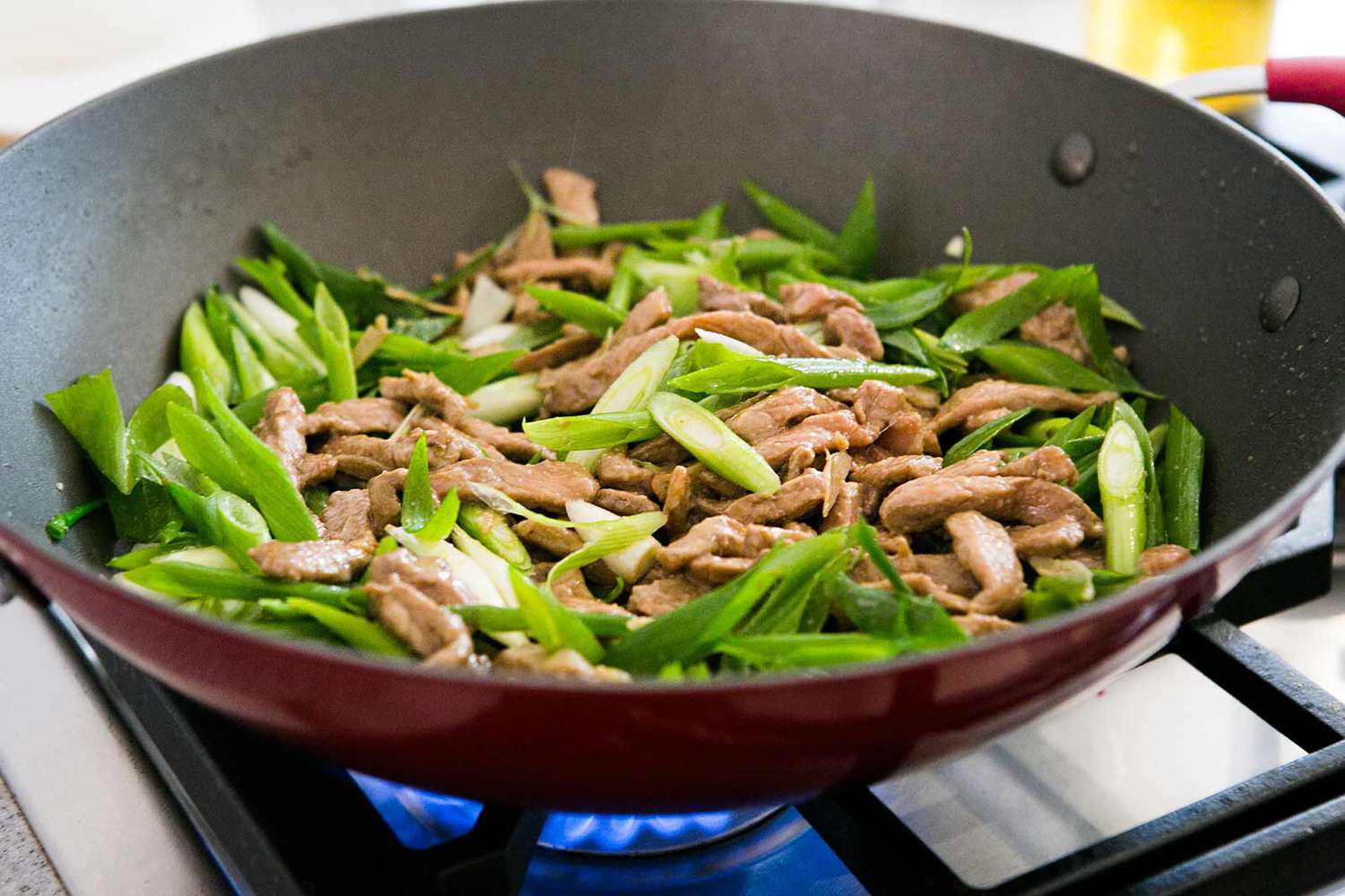 Spicy Pork Stir-Fry with Bell Peppers and Green Onions