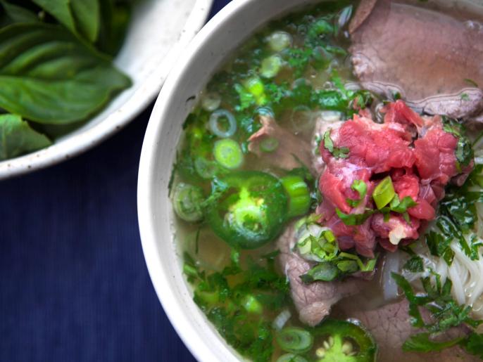 Vietnamese Pho Bo with Rare Beef and Fresh Herbs