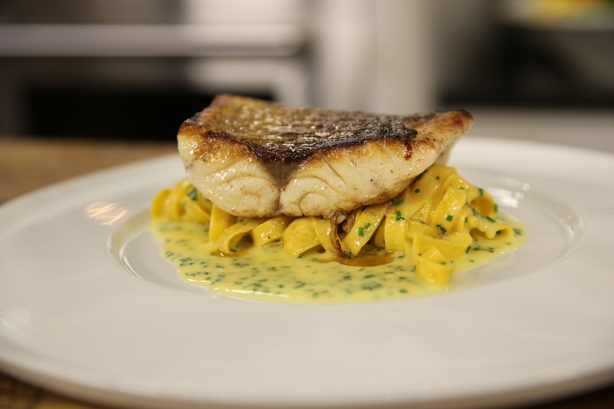 Pan-Seared Sea Bass with Charred Lemon Beurre Blanc