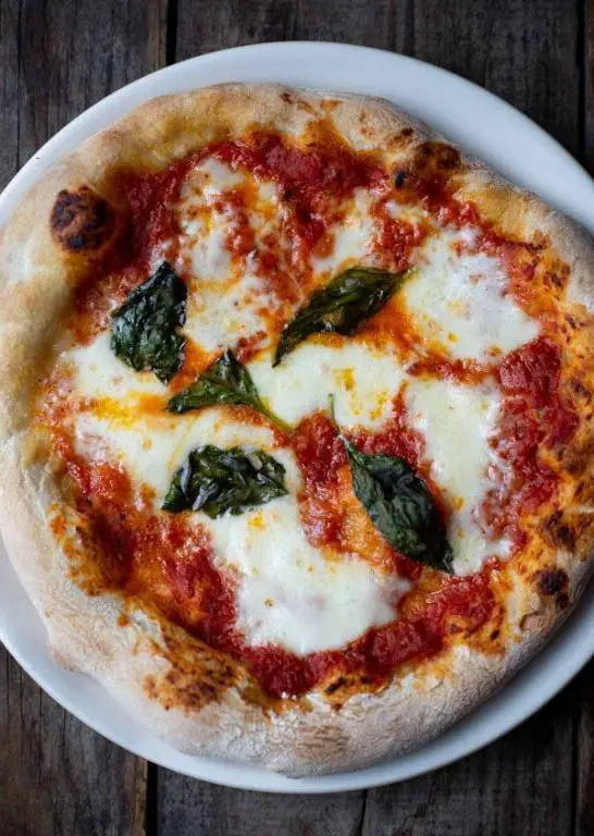 Wood-Fired Margherita Pizza with Fresh Basil and Buffalo Mozzarella