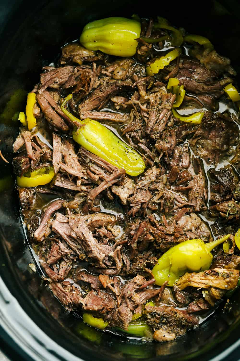 Slow-Simmered Italian Beef with Peppers and Garlic