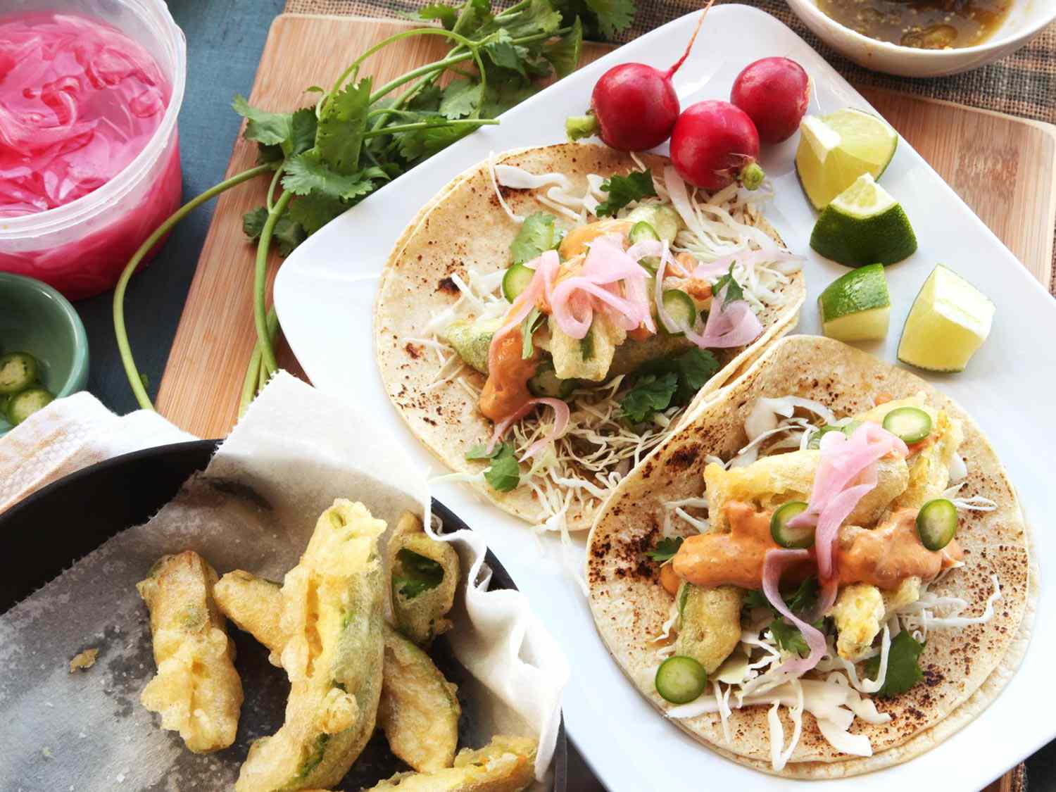 Chipotle-Spiced Pork Tacos with Pickled Red Onion and Avocado Crema