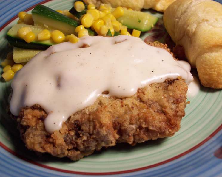 Classic American Chicken-Fried Steak with Creamy Pepper Gravy