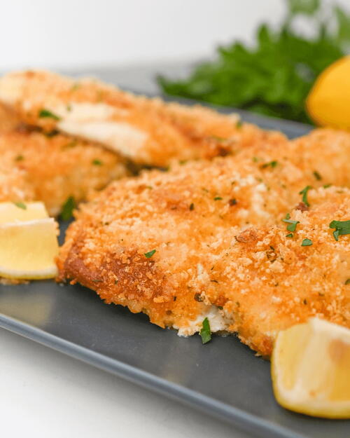 Herb-Crusted Parmesan Chicken Breasts with Garlic Herb Butter