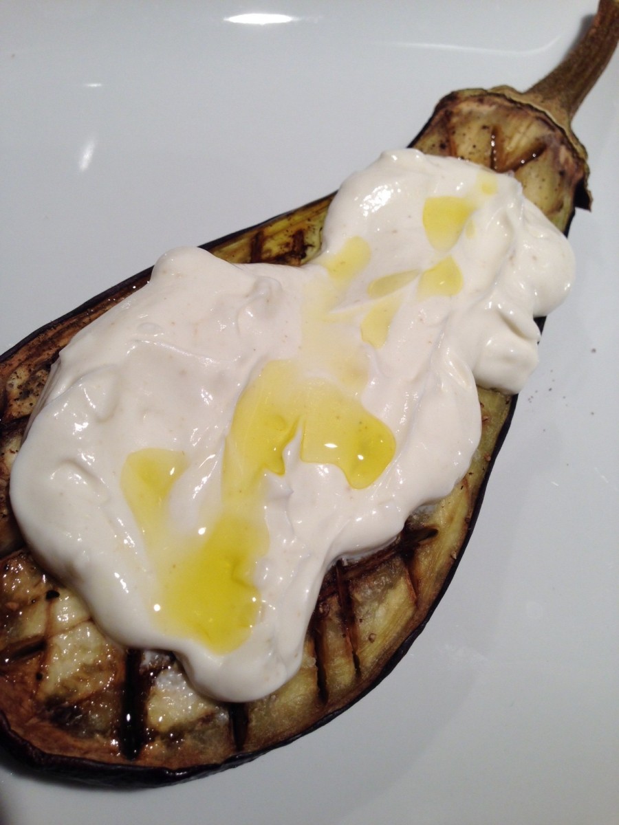 Slow-Roasted Eggplant with Garlic Yogurt Sauce and Pine Nuts