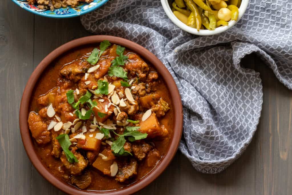 Saffron-Infused Lamb Tagine with Apricots and Almonds