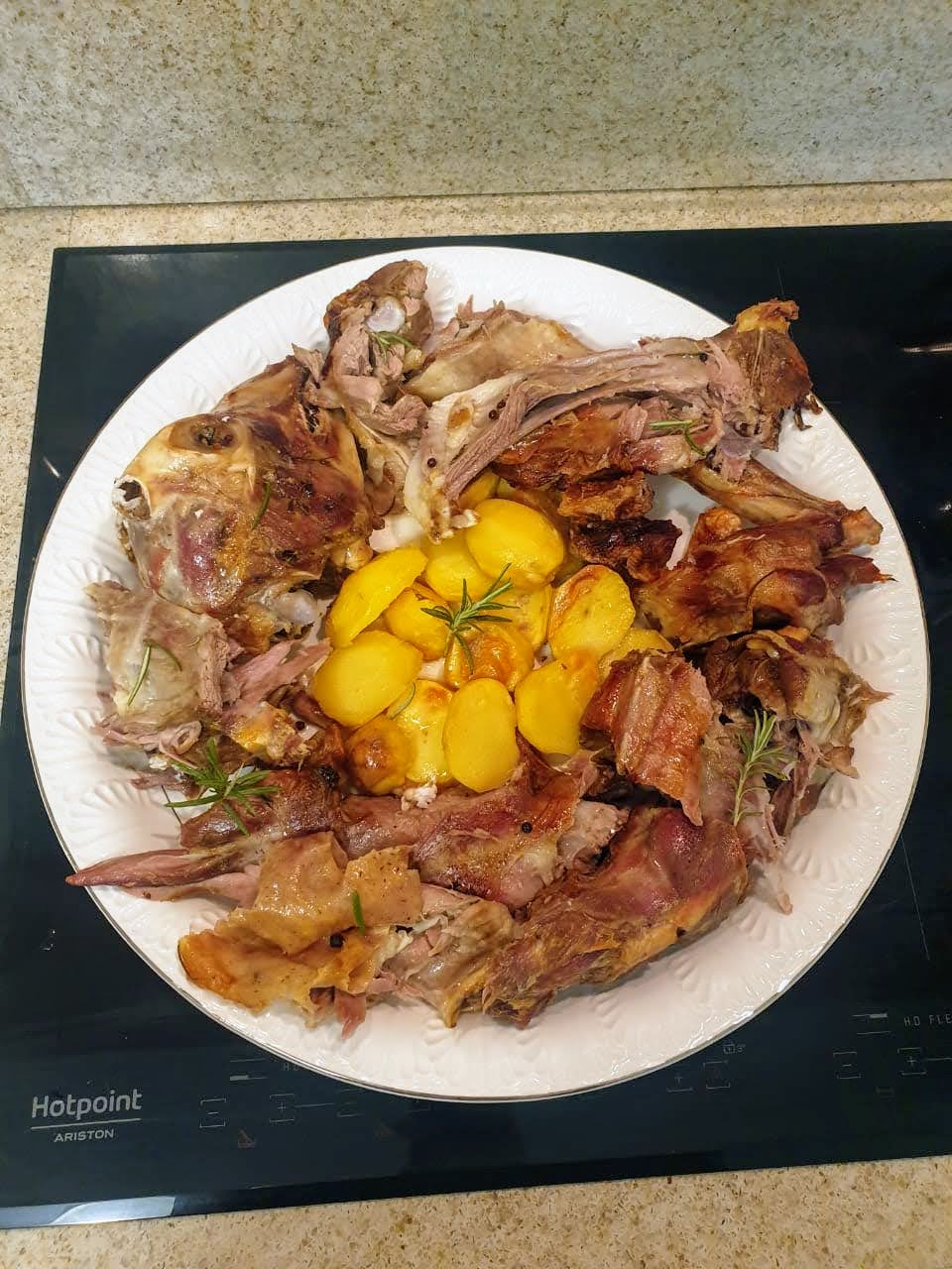 Baked Kid Goat Shoulder with Rosemary and Garlic
